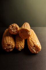 Sweet fresh corn on black background