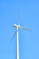 Fototapeta premium white windmill with blue sky