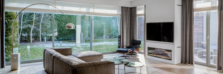 Living room with window wall, panorama