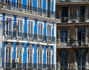 Colorful windows with ornamental old typical portuguese tiles on the streets of Lisbon, Portugal.