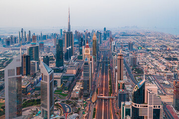 Amazing Dubai skyline at the sunset, aerial view of skyscrapers in United Arab Emirates in the Middle East
