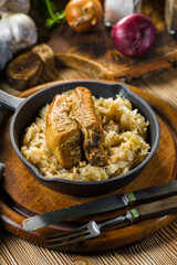Traditional spare ribs baked in sauerkraut.