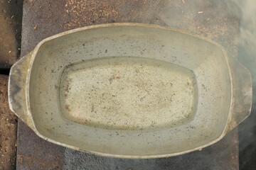 Pilaf in a cauldron with spoon