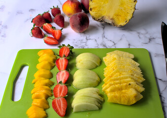 Preparing fruit salad