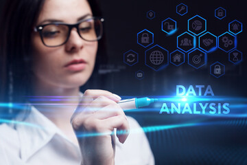 Business, Technology, Internet and network concept. Young businessman working on a virtual screen of the future and sees the inscription: Data analysis