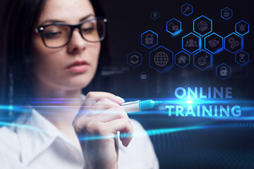 Business, Technology, Internet and network concept. Young businessman working on a virtual screen of the future and sees the inscription: Online training