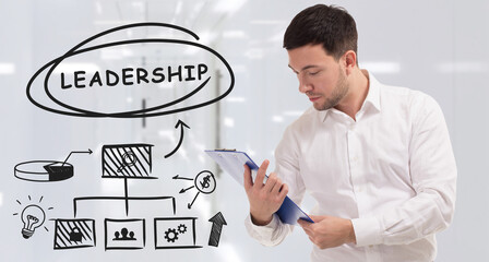 Business, technology, internet and network concept. Young businessman thinks over the steps for successful growth: Leadership