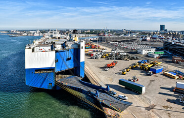 View over the vehicle terminal in the port of Southampton in the United Kingdom. A large vehicle...