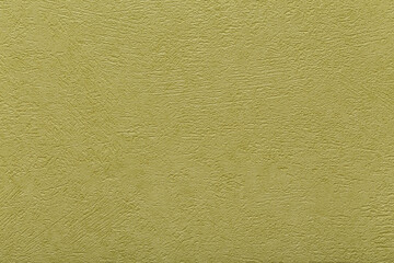 Green, olive plaster. Stucco relief. Rough background and texture.