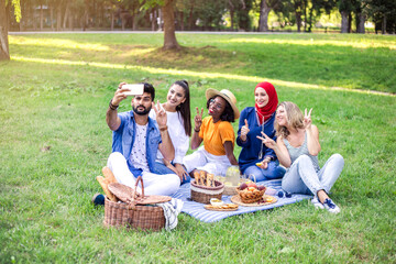 Best friends are on picnic in the park.