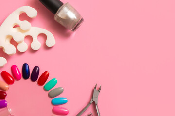 Manicure and pedicure accessories on pink background