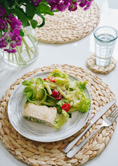 fresh salad with turkey on a table