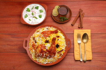 Chicken dum  Biryani_Indian Biriyani_wooden background