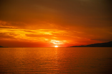 Fototapeta premium Sunset over the sea of Mykonos