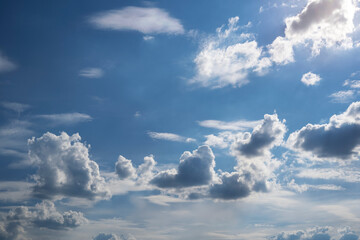 Fototapeta na wymiar Dramatic clouds with blue sky over the horizon
