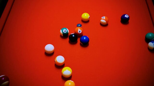 Billard kick off, on a red billard table