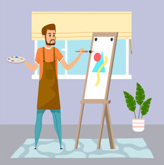 Young guy drawing abstract picture, triangle amd circle at easel using paint and brush. Home activity or leisure time. Houseplant, window with curtains, carpet decorate room. Quarantine self-isolation