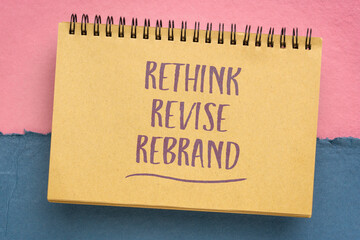 rethink, revise, rebrand - motivational handwriting in a spiral sketchbook, business or personal development concept
