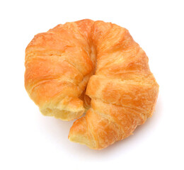 Fresh and tasty croissant over white background
