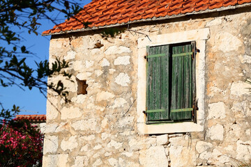 Fototapeta na wymiar Traditional Mediterranean architecture in small town Sutivan, on island Brac, Croatia.