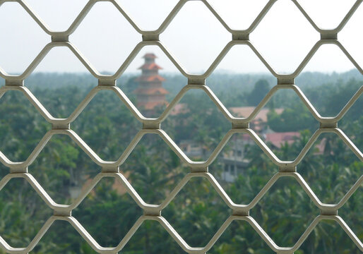 Aluminum Window Grille overlooking an Indian Temple