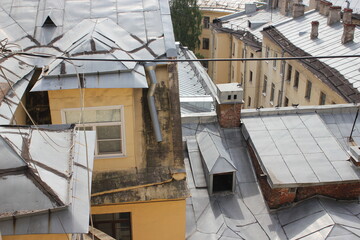 Saint-Petersburg, Russia - 10.06.20. Cityscape panorama of old central city part, view from a roof. Famous rooftops of St. Petersburg with Saint Isaac's Cathedralat the background.