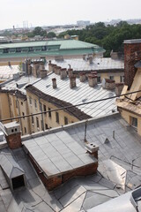 Saint-Petersburg, Russia - 10.06.20. Cityscape panorama of old central city part, view from a roof. Famous rooftops of St. Petersburg with Saint Isaac's Cathedralat the background.