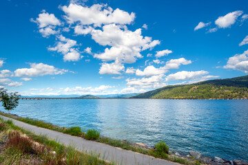 View of Lake Pend Oreille and the mountains of Sandpoint North Idaho, USA, from the Sandpoint Bay Long Bridge on a beautiful summer afternoon