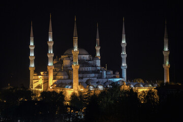 Sultanahmet (Blue Mosque) with its six minarets and dome illuminated in Istanbul, Turkey 