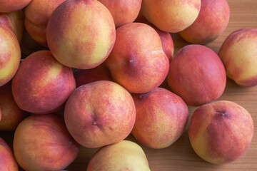 Fototapeta na wymiar Ripe sweet whole peaches