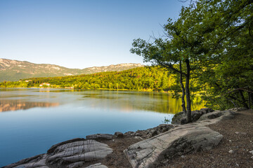 View of the beautiful Lake Monticolo in the morning in the municipality of Eppan in Italian South Tyrol.