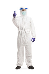 Specialist in a hazmat suit measuring temperature