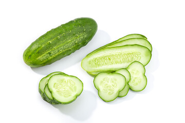 Organic Cucumber and slices isolated on white background. Cucumis sativus