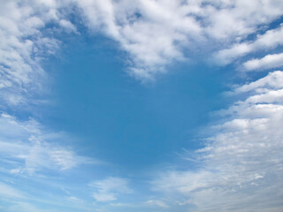 Heart-shaped clouds in the blue sky during the day
