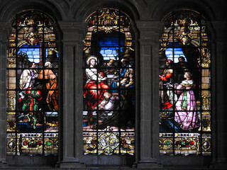 Fototapeta na wymiar Stained glass triptych from the cathedral in Malaga