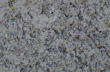 grey background of the old cinder block close-up
