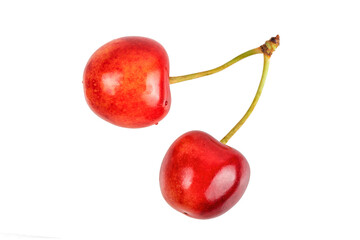 Sweet cherries with a shadow on a white background.