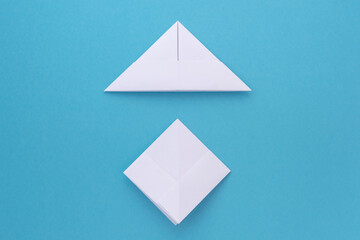 assembly procedure for a white paper ship. Origami.