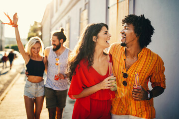 Happy group of friends having fun, travelling and smiling