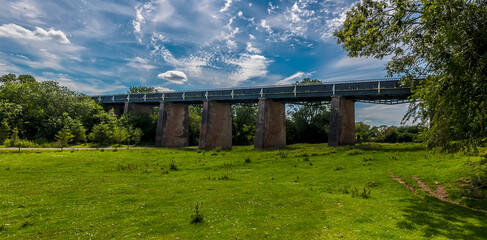 Fototapeta na wymiar A panorama view from a field towards the Edstone Aqueduct, Warwickshire, the longest aqueduct in England