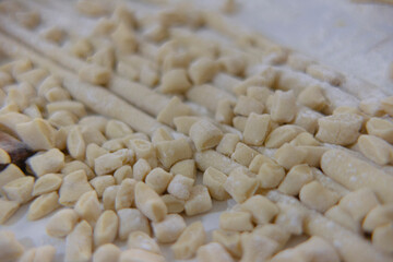 making homemade potato gnocchi. Dough and flour. Cooking Italian food.