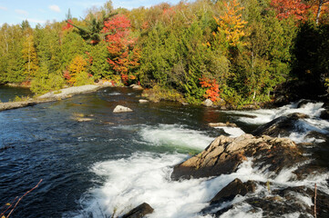 Scenery of Autumn landscape stock photos.  Waterfall Autumn scenery.