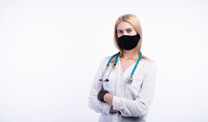 Cheerful happy doctor with crossed hands on white background.