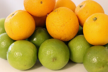 Beautiful lemons and oranges arranged on a table. A fruit rich in vitamin c.