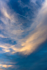 warm majestic cloud in navy sky