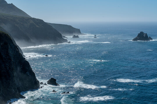 USA, California, Big Sur, Seascape with cliffs and rock formations on sunny day