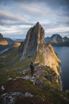 Norway, Senja, Man hiking near Segla mountain