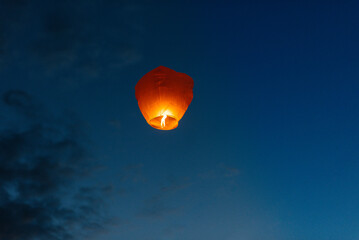In the evening, at sunset, people with their relatives and friends launch traditional lanterns....