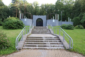 Fototapeta premium mystic gate with brick stairs in Belarus