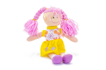 Tender plush doll with pink braids.